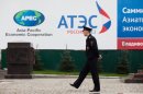 A police officer patrols the central business district of Vladivostok, Russia, Saturday, Sept. 8, 2012. Leaders from the APEC countries are attending their annual summit in the eastern Russian city till Sept. 9. (AP Photo/Alexander Khitrov)