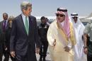 FILE - In this Tuesday, June 25, 2013 file photo, U.S. Secretary of State John Kerry, left, is greeted by Saudi Foreign Minister Prince Saud al-Faisal upon arrival in Jeddah, Saudi Arabia. One day, Saudi Arabia looks to spend $6.8 billion in its latest buying spree of American weapons. Two days later, the kingdom vents its anger at the U.S. 's Mideast policy by snubbing a seat on the U.N. Security Council in a show of discontent. A mix of both customer and critic, Saudi Arabia is trying to carve out its own path to counter U.S. moves such as outreach to Iran, while knowing it still needs its longtime ally as a powerful big brother. (AP Photo/Jacquelyn Martin, Pool, File)