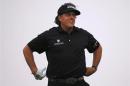 Mickelson watches his tee on the third hole during Abu Dhabi Golf championship