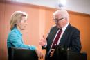 FILE - In this Jan. 15, 2014 file photo German Minister of Defence Ursula von der Leyen, left, and German Foreign Minister Frank-Walter Steinmeier talk at the beginning of a cabinet meeting at the Federal Chancellery in Berlin, Germany. After years in the diplomatic shadows, Germany looks keen to shed its image as a foreign-policy lightweight and assume a more vigorous role in shaping European policies in global hotspots from central Africa to Syria. New Foreign Minister Steinmeier has declared that Europe "cannot leave France alone" in Africa. He and von der Leyen are preparing to reinforce Germany's military role in Mali and help France at least logistically in Central African Republic. (AP Photo/dpa, Kay Nietfeld, File)