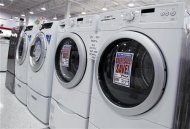 <p>Washers and dryers are seen on display at a store in New York July 28, 2010. REUTERS/Shannon Stapleton</p>