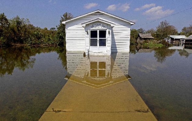 The Stumpy Point Congregational Holiness Church is shown surrounded by water following the effects of Hurricane Irene in Stumpy Point, N.C., Sunday, Aug. 28, 2011. The storm that spent 12-hours scouri