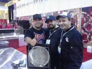 Andrew and his Goodfella's team celebrate their win at the Pizza Expo. 
