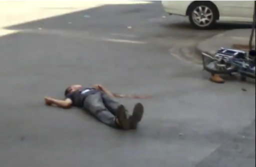 In this image from amateur video a youth is claimed to lie bleeding in a square in Homs, Syria Monday Aug 22 2011 after shots were fired at protesters against the regime of President Bashar Assad. Thousands of anti-government protesters took to the streets across Syria Monday after a televised appearance by President  Assad, shouting for him to step down and chanting 