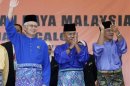 File picture of Malaysia's PM Najib Razak acknowledging supporters in Pekan