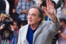 US film director Oliver Stone warned that once elected, people should expect Hillary Clinton to be "much more aggressive" than current President Barack Obama, both on the war in Syria and against Russia