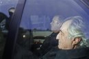 Bernard Madoff is escorted from Federal Court in New York
