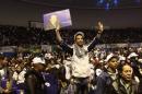 A supporter of current Algerian President and candidate in the forthcoming presidential election Bouteflika holds a placard in Algiers