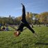 A woman practices aerobic moves in New York's Central Park