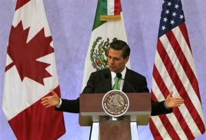 Mexico's President Pena Nieto gives a speech during a news conference at the North American Leaders' Summit in Toluca