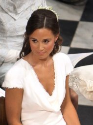 In this April 29, 2011 photo, Pippa Middleton, the sister of Kate Middleton, sits in the pews of Westminster Abbey in London during the wedding ceremony of Prince William and Kate Middleton. Pippa Middleton's social schedule Monday, June 13, 2011, generated intense speculation about who — if anyone — she's dating. She's been seen around town — and in Spain — with former flame George Percy, son of the Duke of Northumberland, one of Britain's richest men. (AP Photo/Clara Molden, Pool)