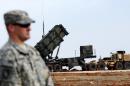 A US soldier stands in front of a Patriot missile system at a Turkish military base in Gaziantep, southeast Turkey, on February 5, 2013