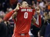 Ohio State forward Jared Sullinger celebrates his team's 77-70 victory over Syracuse in the East Regional final game in the NCAA men's college basketball tournament, Saturday, March 24, 2012, in Boston. (AP Photo/Elise Amendola)