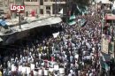 This image made from amateur video and released by Douma Revolution in Syria Friday, April 13, 2012 purports to show a large anti-government demonstration in Douma, Syria. (AP Photo/Douma Revolotion in Syria via AP video) THE ASSOCIATED PRESS CANNOT INDEPENDENTLY VERIFY THE CONTENT, DATE, LOCATION OR AUTHENTICITY OF THIS MATERIAL. TV OUT