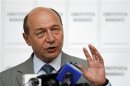 Romania's suspended President Basescu addresses media at his campaign headquarters in Bucharest