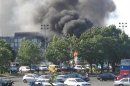 Smoke is seen after a blast at Bulgaria's Burgas airport