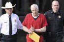 Jerry Sandusky leaves the Centre County Courthouse after his sentencing in his child sex abuse case in Bellefonte