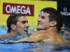 Michael Phelps and Charlie Houchin talk after swimming in the men's 200-meter freestyle final at the U.S. Olympic swimming trials, Wednesday, June 27, 2012, in Omaha, Neb. (AP Photo/Mark Humphrey)