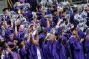 Students celebrate at the beginning of the commencement ceremonies for New York University on May 21, 2014