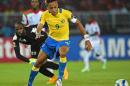 Gabon's forward Pierre-Emerick Aubameyang controls the ball on his way to score a goal during the 2015 African Cup of Nations group A football match between Burkina Faso and Gabon at Bata Stadium in Bata on January 17, 2015