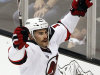 New Jersey Devils' Adam Henrique (14) reacts after scoring the game-winning goal in the third period during Game 4 of the NHL hockey Stanley Cup finals against the Los Angeles Kings, Wednesday, June 6, 2012, in Los Angeles.  (AP Photo/Jae C. Hong)