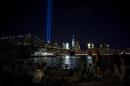 The Tribute in Light, viewed from the Brooklyn borough of New York, rises above the lower Manhattan skyline, Sunday, Sept. 11, 2016, in New York, the fifteenth anniversary of the terrorist attacks of Sept. 11, 2001 on the United States. (AP Photo/Craig Ruttle)