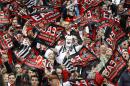 Guingamp supporters wave flags and chant slogans in the stands of of the Stade de France, before the start of the French Cup final match between Guingamp and Rennes at the Stade de France Stadium, in Saint Denis, North of Paris, Saturday, May 3, 2014. (AP Photo/Remy de la Mauviniere)