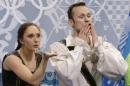 Maylin Wende and Daniel Wende of Germany blow kisses to spectators in the results area after competing in the pairs free skate figure skating competition at the Iceberg Skating Palace during the 2014 Winter Olympics, Wednesday, Feb. 12, 2014, in Sochi, Russia. (AP Photo/Darron Cummings)