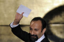 Asghar Farhadi, of Iran, accepts the Oscar for best foreign language film for â€œA Separationâ€ during the 84th Academy Awards on Sunday, Feb. 26, 2012, in the Hollywood section of Los Angeles. (AP Photo/Mark J. Terrill)