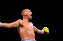 Britain's Tony Bellew retained his World Boxing Council cruiserweight title with a third-round stoppage of BJ Flores at the Echo Arena in Liverpool