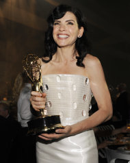 "The Good Wife" cast member Julianna Margulies poses with the Emmy for best lead actress in a drama series at the 63rd Primetime Emmy Awards Governors Ball on Sunday, Sept. 18, 2011 in Los Angeles. (AP Photo/Chris Pizzello)