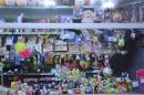 Handout picture of toys and other small items tagged with their prices based on grey market rates in a shop in downtown Pyongyang