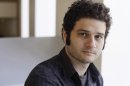 In this photo taken Thursday April 26, 2012, Dustin Moskovitz co-founder of the collaborative software companay Asana, poses outside of his office in San Francisco. Facebook co-founder and former Mark Zuckerberg roommate Dustin Moskovitz is by many accounts the world's youngest self-made billionaire. But the 27-year-old isn't sipping champagne in the Caribbean. Instead he's thrown himself back into San Francisco's startup churn with an online collaboration app he says will become the world's next $100 billion company. (AP Photo/Eric Risberg)