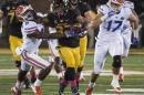 FILE - In this Oct. 10, 2015, file photo, Missouri running back Russell Hansbrough, center, fights his way past Florida's Nick Washington, left, and Jordan Sherit, right, during an NCAA college football game in Columbia, Mo. Some Missouri football players announced Saturday night, Nov. 7, 2015, on Twitter that they will not participate in team activities until the university president, Tim Wolfe, is removed from office. The statement from the athletes of color was tweeted out Saturday by several members of the football team, including Hansbrough. (AP Photo/L.G. Patterson. File)