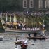 The royal barge Gloriana carries the Olympic flame in a cauldron on board, as it leaves Hampton Court Palace in London along the river Thames, on its way into central London on the final day of the Torch Relay, Friday, July 27, 2012. (AP Photo/Sang Tan)