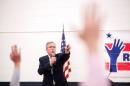 Former Florida Governor Jeb Bush takes questions at a town hall meeting in Reno