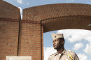 Texas A&M junior Marquis Alexander poses for a photograph by the Corps Arches, the entry point to the Corps of Cadets residence halls, on the A&M campus, Wednesday, April 11, 2012, in College Station, Texas. Alexander has been appointed to Corps Commander, the top leadership position for the A&M Corps of Cadets, for the next year. (AP Photo/Dave Einsel)
