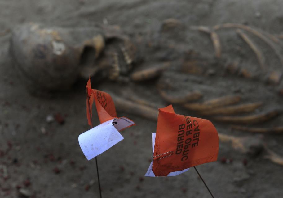 A marked human skeleton is seen at a construction site in the former war zone in Mannar