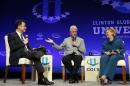 Former President Bill Clinton, center, and former Secretary of State Hillary Rodham Clinton, right, speak with talk show host Jimmy Kimmel during a student conference for the Clinton Global Initiative University, Saturday, March 22, 2014, at Arizona State University in Tempe, Ariz. More than 1,000 college students are gathered at Arizona State University this weekend as part of the Clinton Global Initiative University's efforts to advance solutions to pressing world challenges. (AP Photo/Matt York)