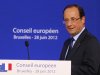 French President Francois Hollande arrives for a press conference at an EU Summit in Brussels, Friday, June 29, 2012. (AP Photo/Michel Euler)