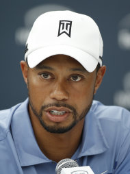 Tiger Woods makes remarks during a news conference at the AT&T National golf tournament at the Aronimink Golf Club Tuesday, June 28, 2011, in Newtown Square, Pa. Woods said he will not play in the tournament as he recovers from injuries to his left leg. (AP Photo/Matt Rourke)