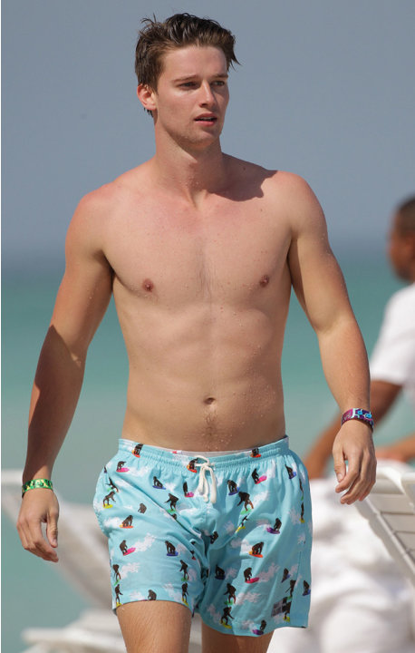 Patrick Schwarzenegger gets rowdy with his friends on Miami Beach during a game of catch