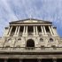 The Bank of England is seen against a blue sky in the City of London