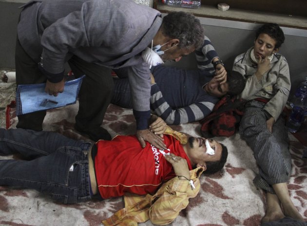 Wounded Egyptian protesters seen at a makeshift hospital during clashes against riot police near Tahrir Square in Cairo