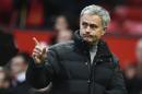 Manchester United's manager Jose Mourinho leaves the pitch at the end of the English FA Cup third round football match between Manchester United and Reading at Old Trafford in Manchester, north west England, on January 7, 2017