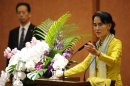 Nobel laureate and Myanmar opposition leader Aung San Suu Kyi answers a question from a student during her lecture session at the University of Tokyo in Tokyo
