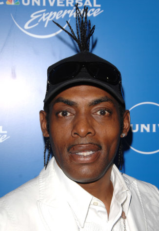 FILE - In this May 12, 2008 photo, Rapper Coolio attends the NBC Universal Experience at Rockefeller Center as part of upfront week. Police say rapper Coolio was arrested in Las Vegas on a warrant charging him with failure to appear in a local court on a traffic ticket almost two years ago. Coolio's real name is Artis Leon Ivey Jr. Officer Laura Meltzer says 48-year-old Artis Leon Ivey Jr. was a passenger in a vehicle officers stopped about 2:20 a.m. Friday, March 9, 2012, several blocks east of the Las Vegas Strip. No one else in the car was arrested. Ivey was sought on a warrant charging him with failure to appear on an illegal stop and driving without a license summons issued in June 2010. (AP Photo/Peter Kramer)