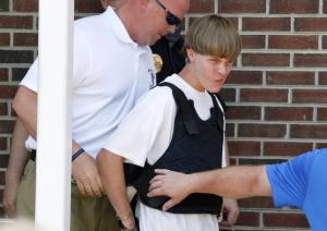 Police lead suspected shooter Dylann Roof into the&nbsp;&hellip;
