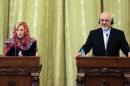 Mohammad Javad Zarif (right) and his Italian counterpart Emma Bonino give a joint press conference in Tehran on December 22, 2013