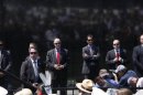 U.S. Secret Service agents watch the crowd during a speech by President Obama in Washington, May 28, 2012. 
